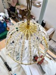 Workshop assembly - the chandelier looks like a golden royal crown