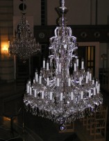 Detail of an extinguished silver chandelier of Maria Theresa 48 light bulbs