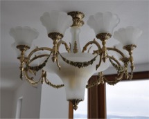 Cast brass chandelier with masssive sand-blasted glass parts