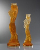 Candlesticks made of orange glass (Amber)