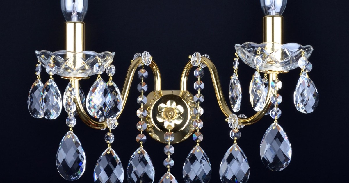 2 Arms brass crystal wall light with cut almonds and tubular arms