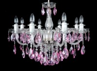 The bottom of a silver chandelier with purple almonds