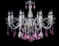 Detail of the lower part of the chandelier with purple crystal almonds