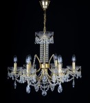 General view of a golden chandelier with 6 metal arms
