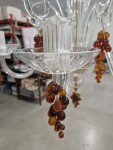 Detail of hanging decorative glass grapes, matte and shiny