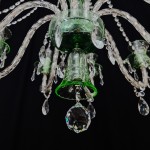 Detail of the lower part of the chandelier with different shades of green