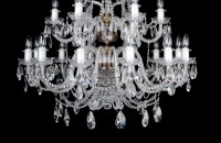 Detail of the lower part of the chandelier - solid profiled glass arms (they look like asterisks in cross section).