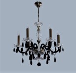 Contrast of black hyalite glass and clear crystal on the chandelier