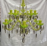 The chandelier is hung with contrasting smoky crystal trimmings