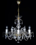 Detail of a smaller 5-arm crystal chandelier with a ceiling rose