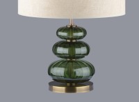 OLIVINE - A lamp with three green balls (pebbles) as a symbol of balance in the interior.