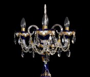 The top of a blue lamp with a crystal "icicle"