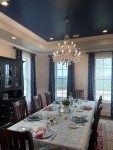 Silver crystal chandelier over a dining table