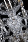 Detail of the light bowl of a tall crystal lamp for the reception of a hotel or company