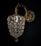 Decorative strass wall sconce made of cast brass