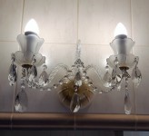 Two-armed crystal wall light made of sandblasted glass