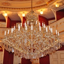Service of the 60-flame central Teresian chandelier in the main theater hall