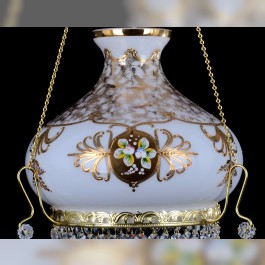 The white chandelier over the table into the dining room