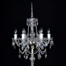 Tall standing crystal lamp in silver metal