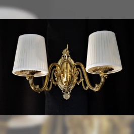 Brass wall light with white lampshades