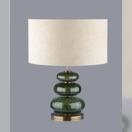 Table lamp made of dark green glass in the color of olivine stone