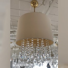 Crystal chandelier with a large textile lampshade