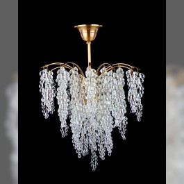 General view of chandelier with hand-woven glass grapes
