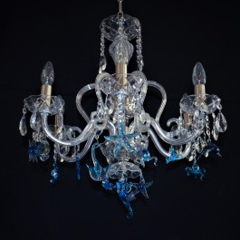 Crystal chandelier with glass figures