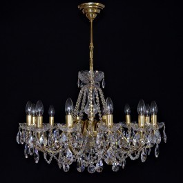 The 12 Arms gold brass crystal chandelier with cut crystal almond. Polished brass.