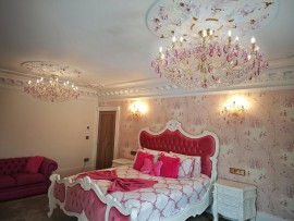 Red bedroom - 18-bulb version with crystal almonds in a purple shade