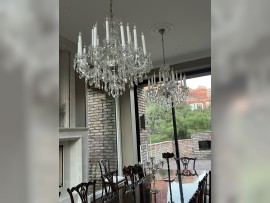 Large Victorian crystal chandelier with long candles in French style