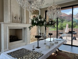 Crystal chandeliers in the wedding hall to create a sublime atmosphere of abundance.
