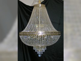 Larger basket composed of large rhinestones with a distinctive brass belt made of cast brass with antique motifs