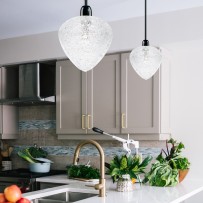 Chandelier with glass hearts above the kitchen counter