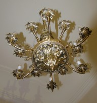The lower part of the chandelier is made of massive brass castings