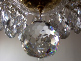 Detail of the large crystal chandelier ball