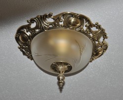 Gold surface mounted chandelier with sandblasted glass