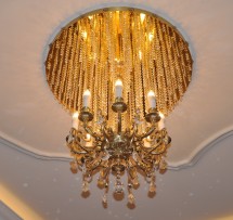 Cast chandelier with metal plate with spotlights 1