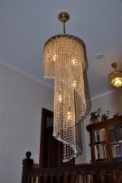 small spiral chandelier with hanging on a rod