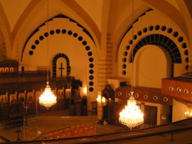 View of chandeliers hanging from the high ceiling of the church 2