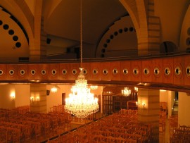View of chandeliers hanging from the high ceiling of the church 4