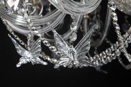 Detail of hanging glass butterflies on the chandelier