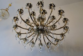Large massive view from below- chandelier made of cast brass 24 bulbs