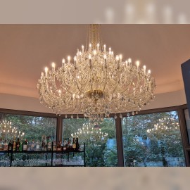 Chandelier service at the customer's place - a large crystal chandelier with 60 bulbs in the gazebo of Café Hajecek.