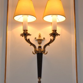 Various crystal wall lights made of cast brass