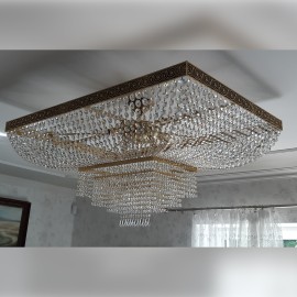 Rectangular crystal chandelier with strass stones in residential interior