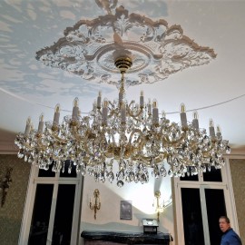 Installation of Maria Theresa chandeliers in a luxury family house (size series 40, 24, 12, 1, bulbs)