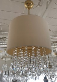 Crystal chandelier with a large textile lampshade