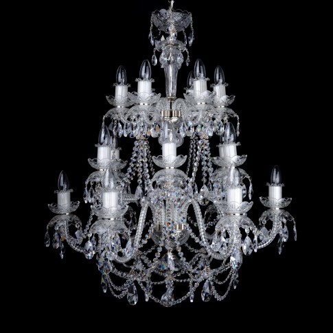 A tall silver crystal chandelier above the dining table