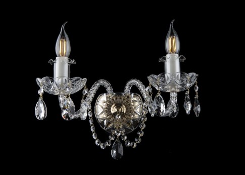 Wall light with twisted arms and crystal glass bowls in the shape of an optical lens